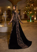 Full-length rear view of the choker-neck velvet dress, highlighting the majestic sweeping cathedral train encrusted with elaborate copper-gold baroque hand-embroidery patterns by Sultan Dress.