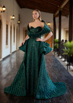 Full-length front view of a majestic 3-in-1 emerald green sequin henna dress, showcasing the detachable ruffled over-skirt, matching detachable fringed shoulder shawl, and handmade 3D waist roses.