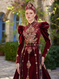 Front view of the burgundy Juliet sleeve maxi Muslim henna dress with gold crystal embroidery and matching headpiece by Sultan Dress.