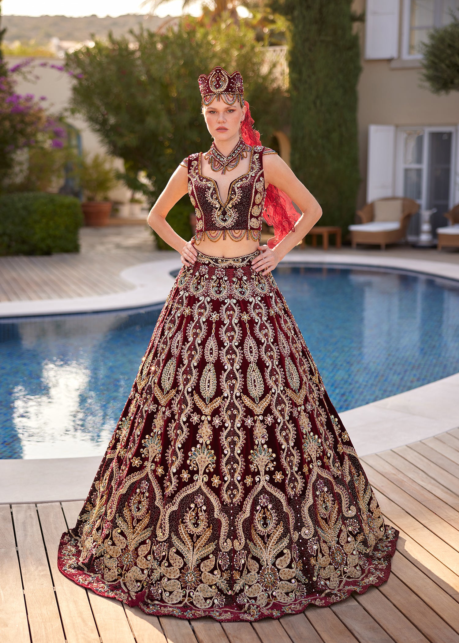 Front view of the Turkish red V-neck heavy embellished two-piece kaftan dress set with gold embroidery, crown headpiece, and choker necklace by Sultan Dress.