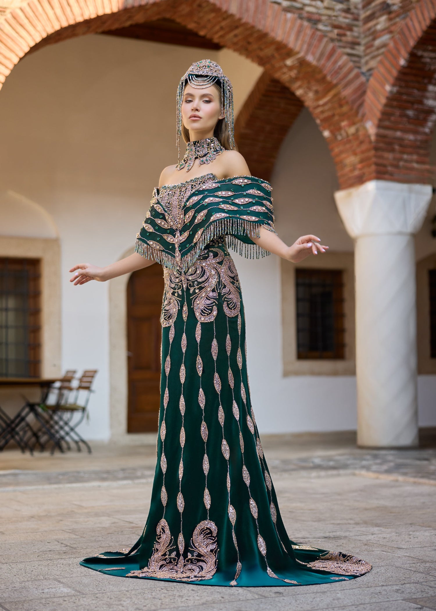 Handcrafted bridal crown and matching necklace designed for an emerald green henna dress with luxury gemstone and bead embellishments.
