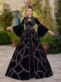 ull-length front view of the beautiful black traditional embroidered henna kaftan gown with bell sleeves and matching crown by Sultan Dress.