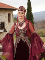 Close-up of the handcrafted gold lace, crystal beadwork, and neck collar accessory on the fitted burgundy velvet Henna gown.