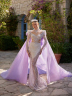 Front view of the white fitted full sequinned long sleeve party dress with high neck choker collar, structured shoulders, and detachable lavender cape train by Sultan Dress.