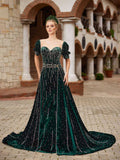 Front view of the elegant emerald green velvet evening dress with crystal bead waterfall embroidery, puff sleeves, and flared train by Sultan Dress.