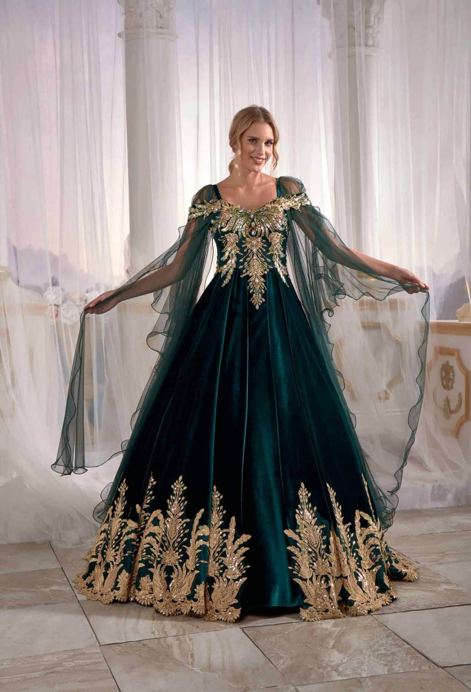 Full-length front view of the emerald green golden embroidery evening maxi caftan dress featuring a velvet tulle veil by Sultan Dress.