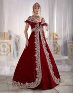 Full-length front view of the red and navy velvet blue soft drape delicate embellished caftan dress by Sultan Dress.