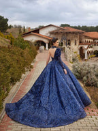 Rear close-up view highlighting the low open back design, beaded high neck piece, and sequin sleeve detail.