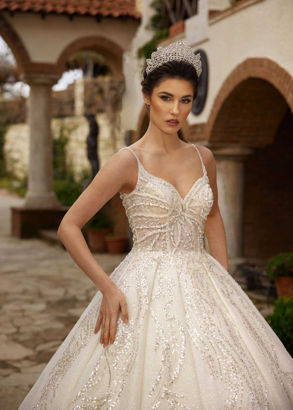 Front view highlighting the spaghetti straps and radial pearl beadwork on the sweetheart corset by Sultan Dress.