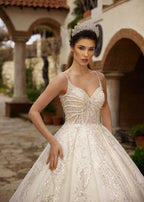 Front view highlighting the spaghetti straps and radial pearl beadwork on the sweetheart corset by Sultan Dress.