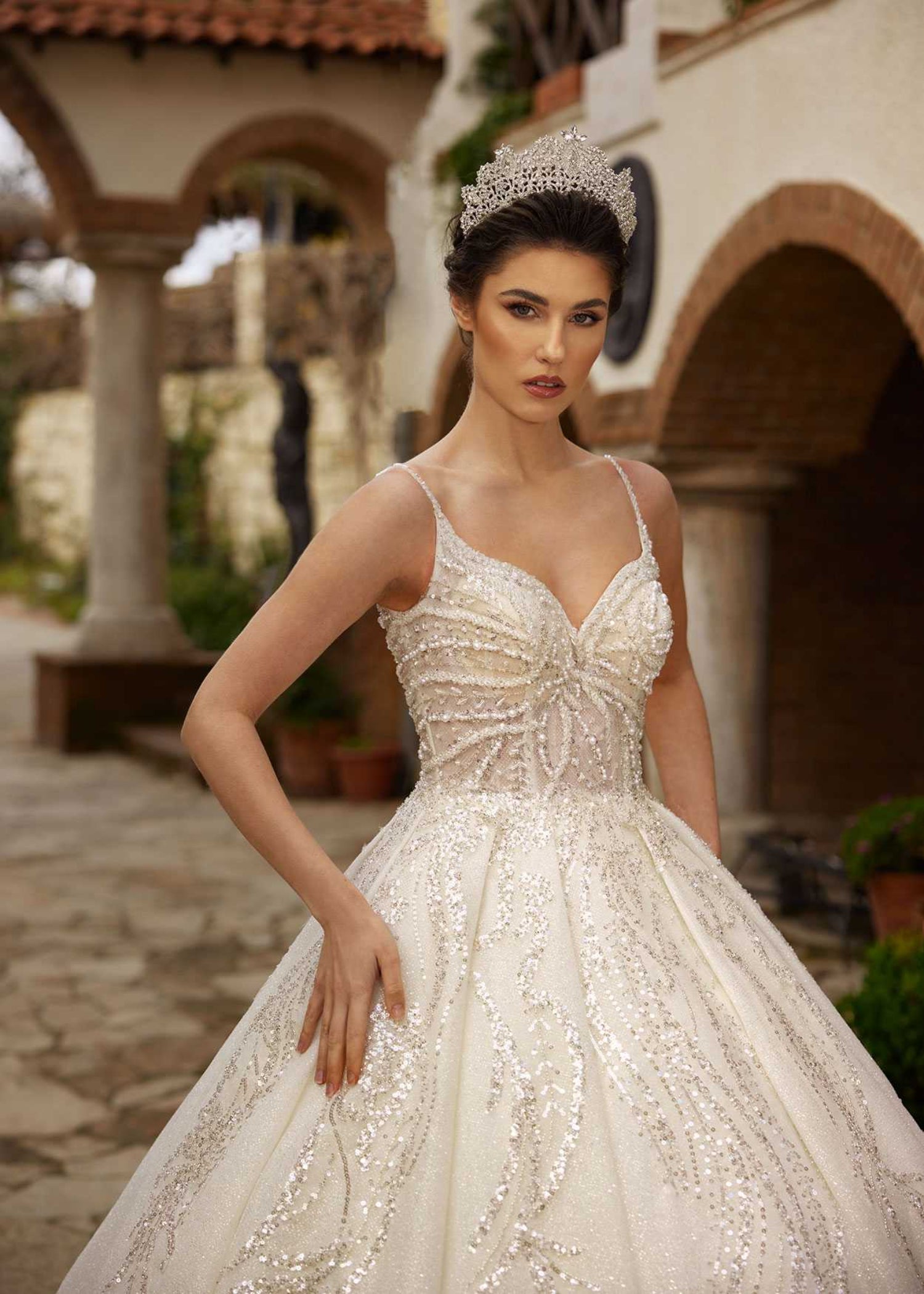 Front view highlighting the spaghetti straps and radial pearl beadwork on the sweetheart corset by Sultan Dress.
