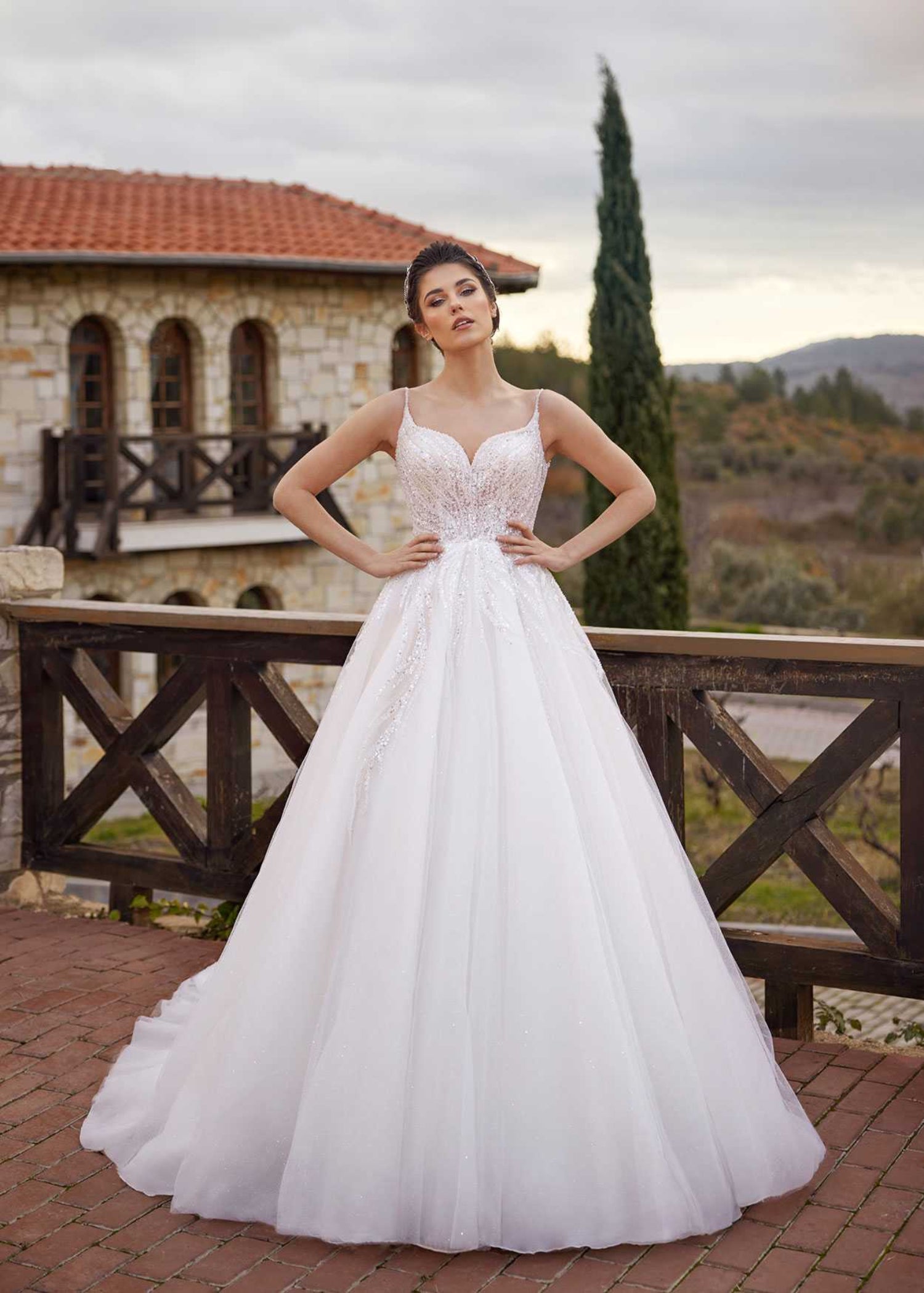 buy Classy Detailed view of the hand-stitched linear sequin pattern and fine crystal beadwork on the structured bridal corset. wedding gowns shopping online